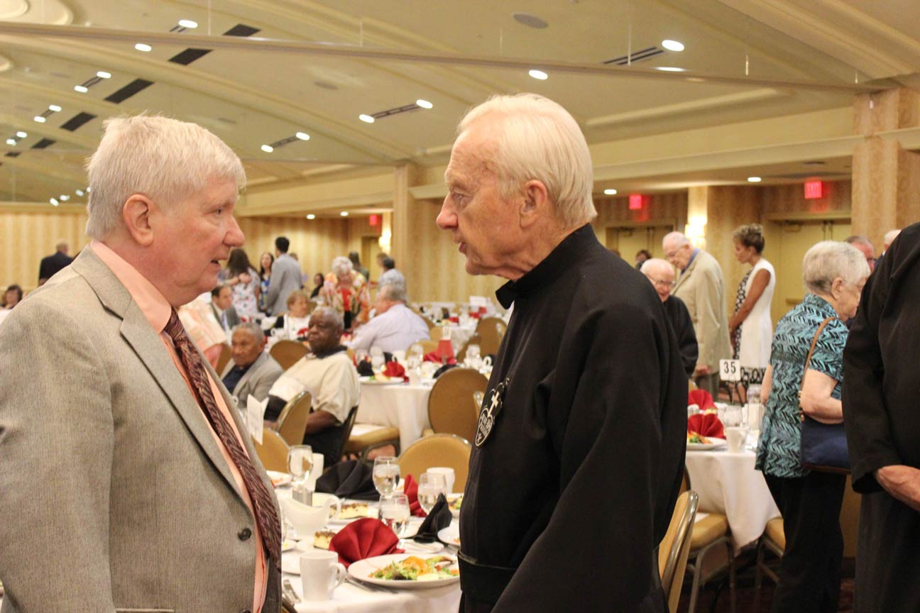 Terry McDevitt and Fr. Sebastian MacDonald before the luncheon began.