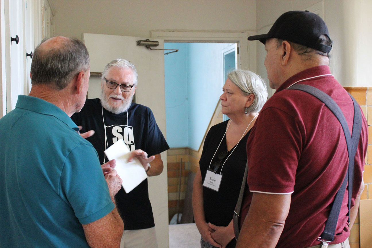 Denny and Essie Reilly reminisce with Rich Padilla and Charlie Phillips in the old kitchen area.