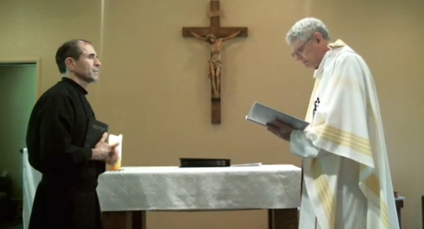 Fr. Joe Moons begins the profession rite by asking Nicholas for his intention.