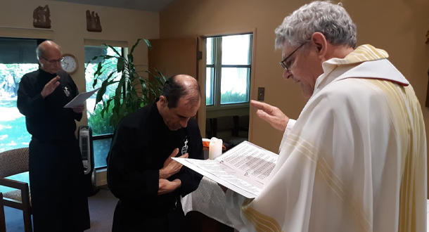 Fr. Joe Moons leads the Assembly in praying for Nicholas’ lifelong fidelity to the Religious Vows.