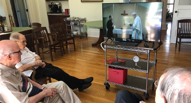 The Passionist Community at Sacred Heart Monastery in Louisville, Kentucky, followed the profession rite via live-streaming.