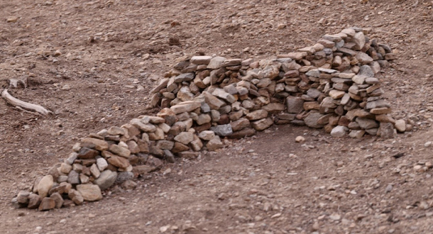 A cross on a walking trail in Southern California near the San Gabriel Mountains