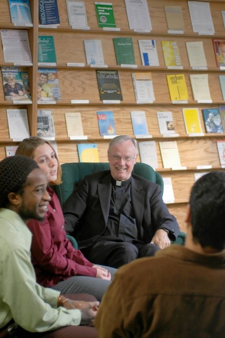 Fr. Don in a discussion group with students at Catholic Theological Union (CTU).