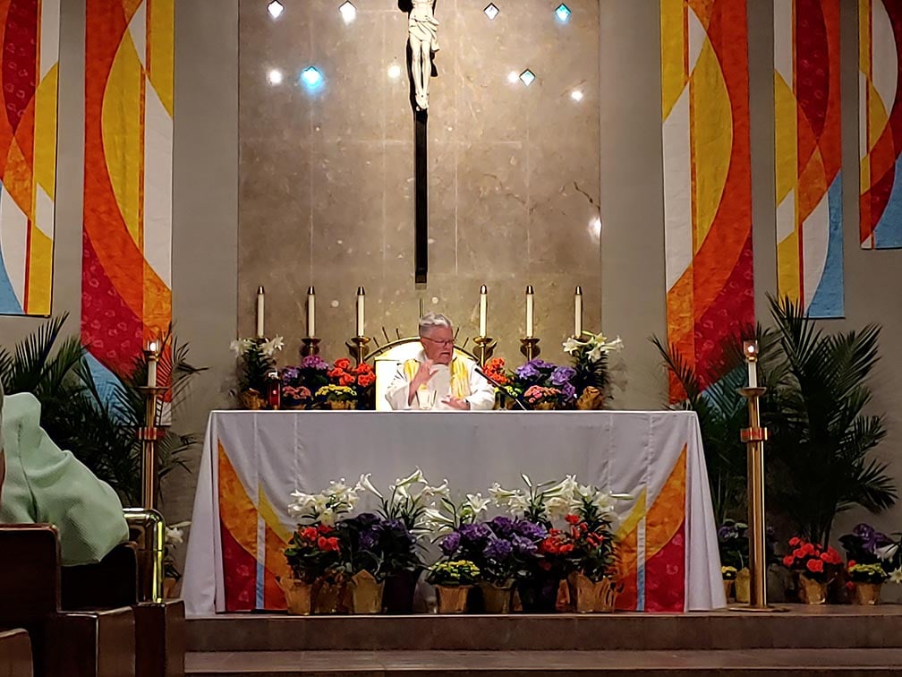 Fr. John Schork, CP celebrating Mass