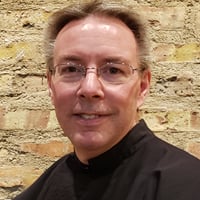 Smiling headshot of Fr. David Colhour, CP, Provincial Superior