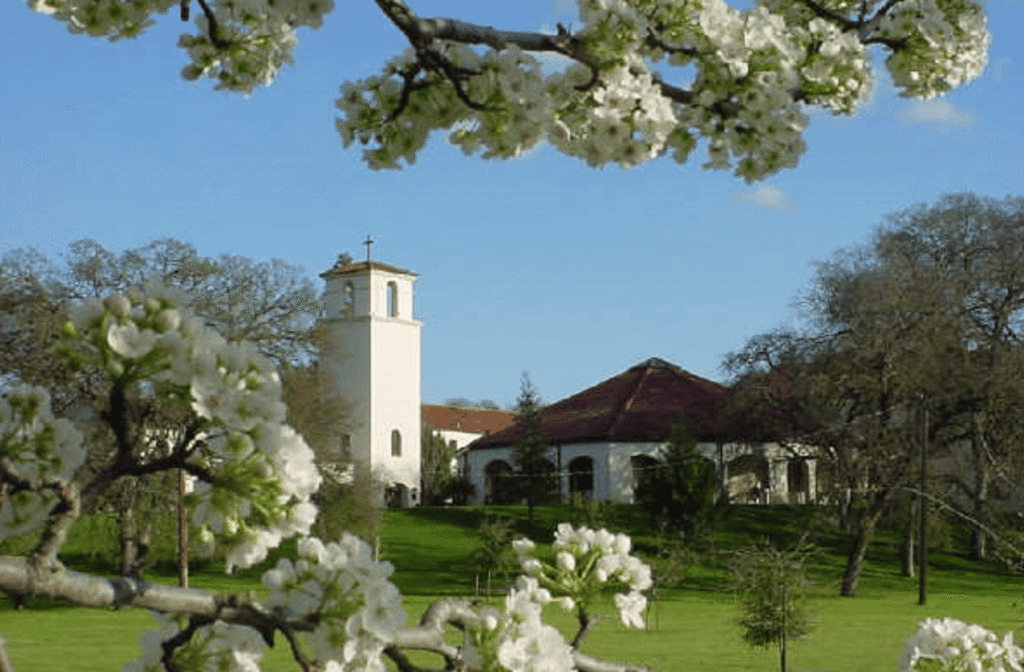 Beautiful flowers framing a tranquil retreat house in Northern California