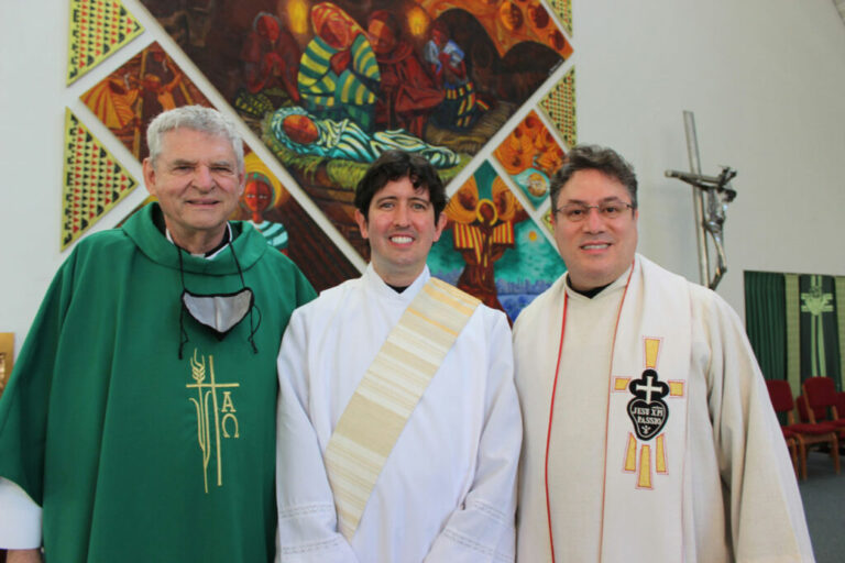 Three smiling Passionist priests