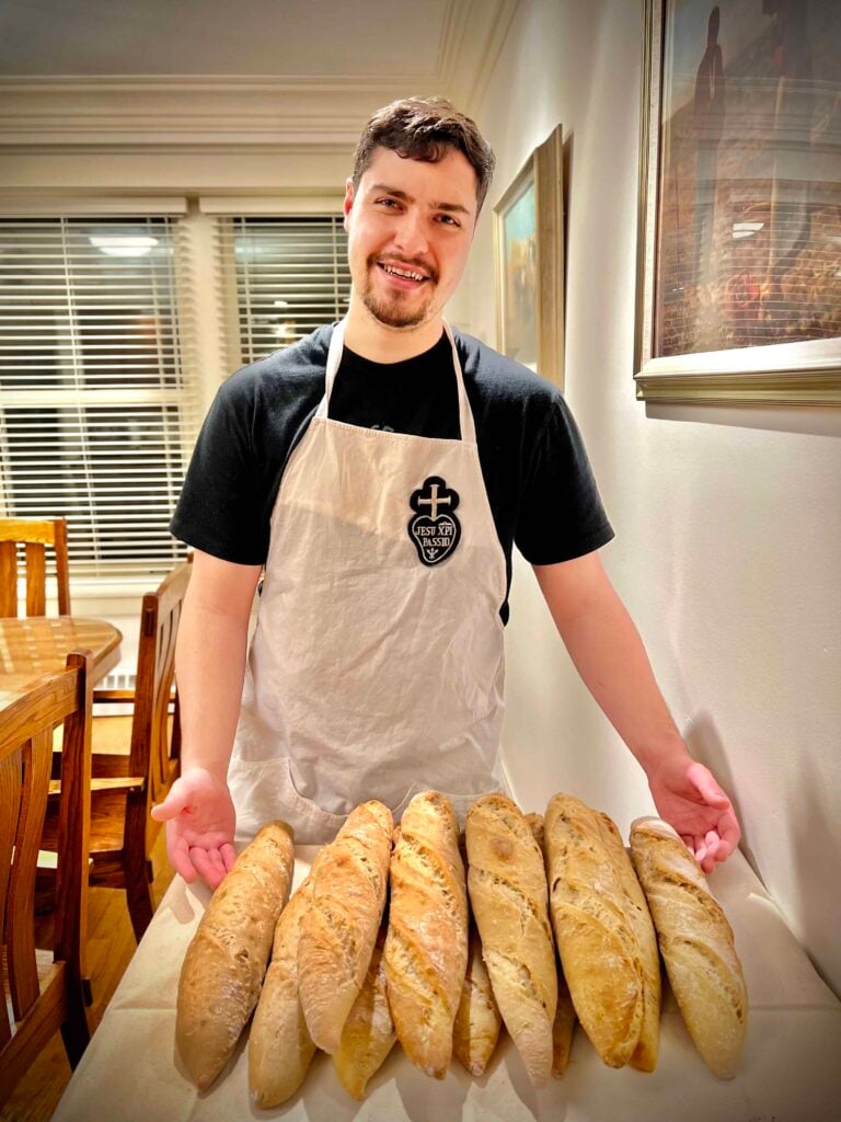 Passionist seminarian Jonathan Ramos happily poses with his freshly baked bread