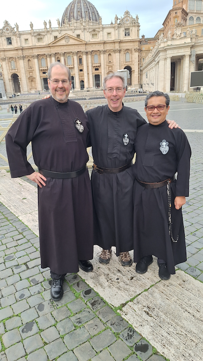 Three smiling Passionist priests in Rome