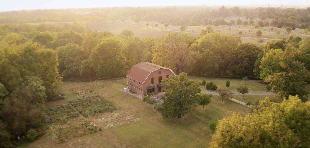 Aerial shot of the Passionist Earth and Spirit Center in Louisville, KY with the sun shining