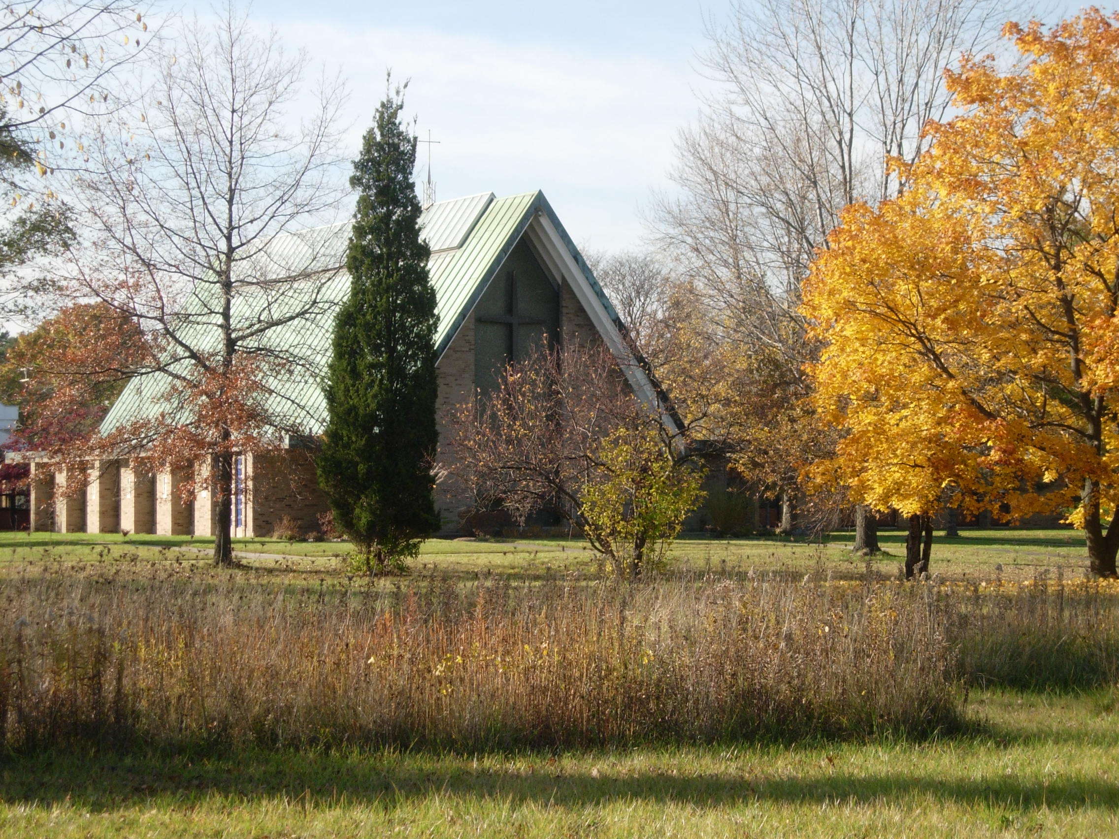 A peaceful Passionist retreat center surrounded by fall foliage