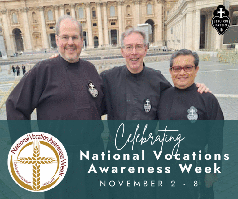 Three smiling Passionists in a stone courtyard in Rome