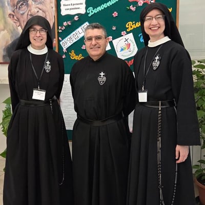 Three smiling Passionists