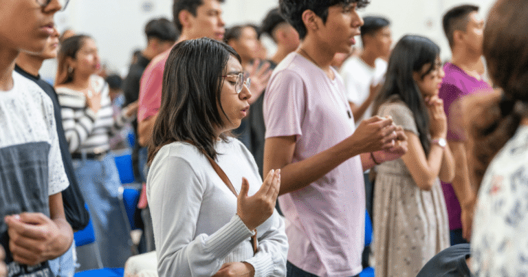 Young people of faith participate in Mass
